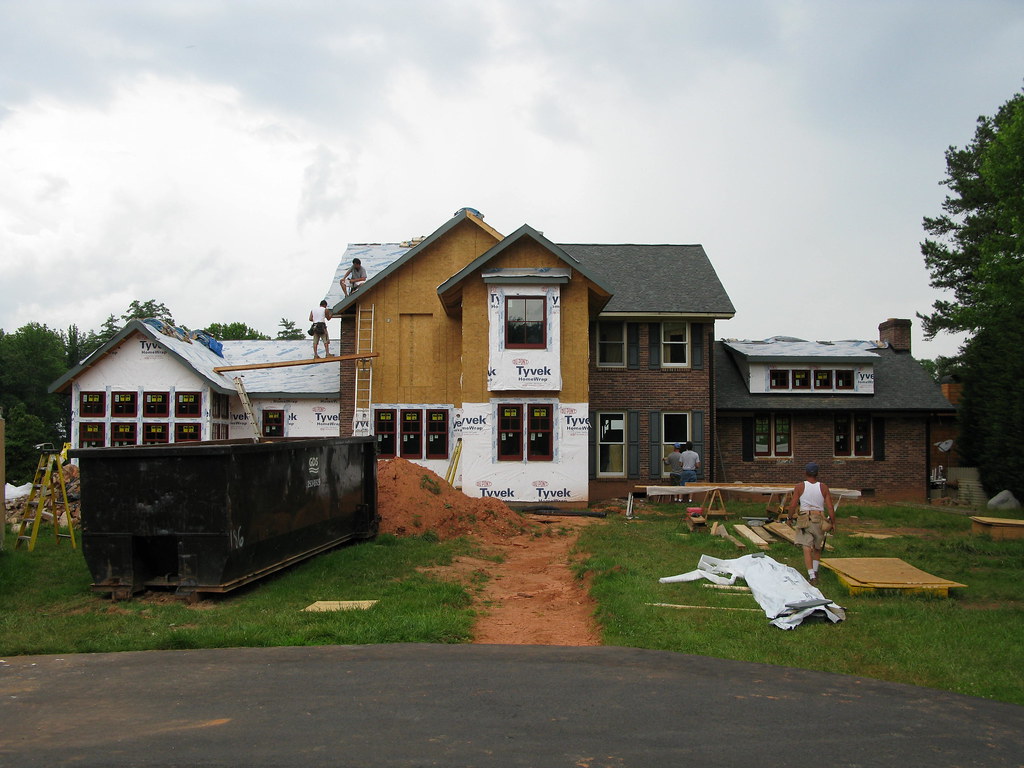 Exterior home renovation and remodel showing new construction